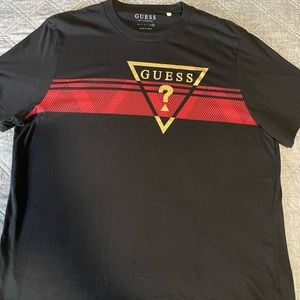 GUESS BLACK SHIRT XXL BUT FIT IS MORE LIKE XL.